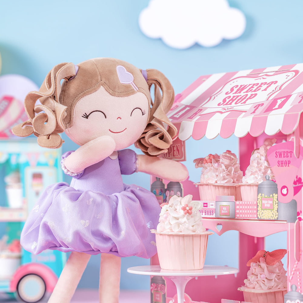 Gloveleya purple dress doll as a comforting bedtime companion for kids.