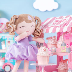 Gloveleya purple dress doll as a comforting bedtime companion for kids.