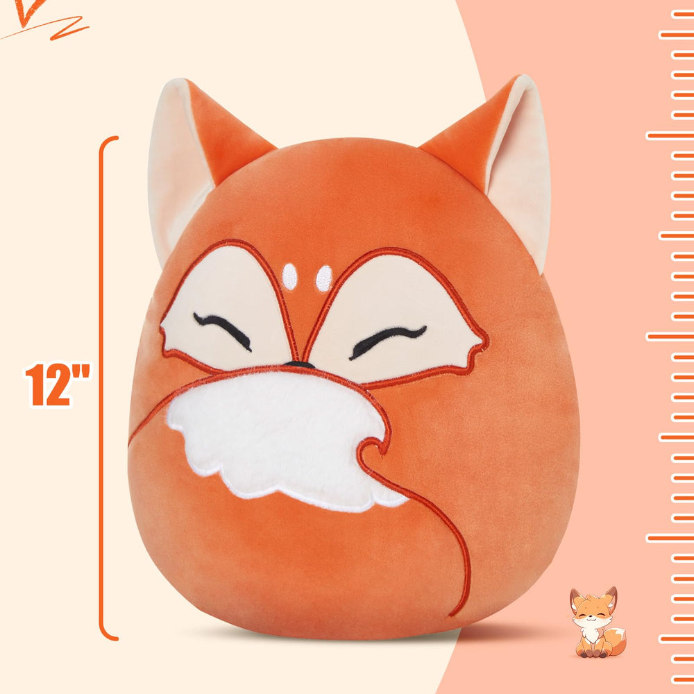 Glow Guards red fox plush on sofa as cute decor.