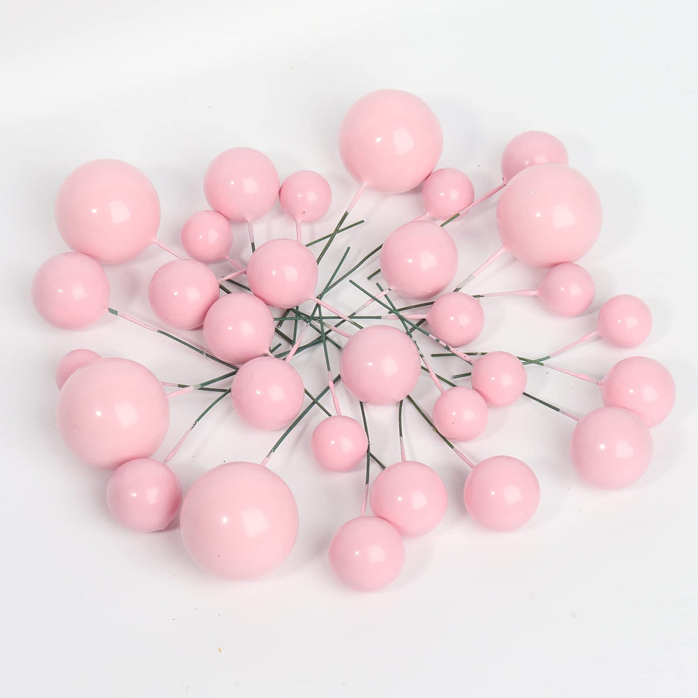 Goensjt pink ball cake topper 2cm close-up for easy placement.