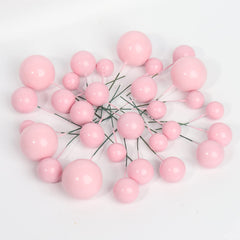 Goensjt pink ball cake topper 2cm close-up for easy placement.