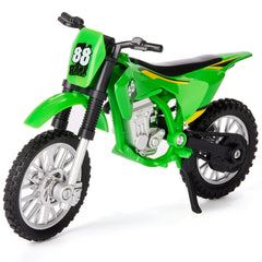 Gogogomoto green dirt bike toy shown in hand for portable play and display.