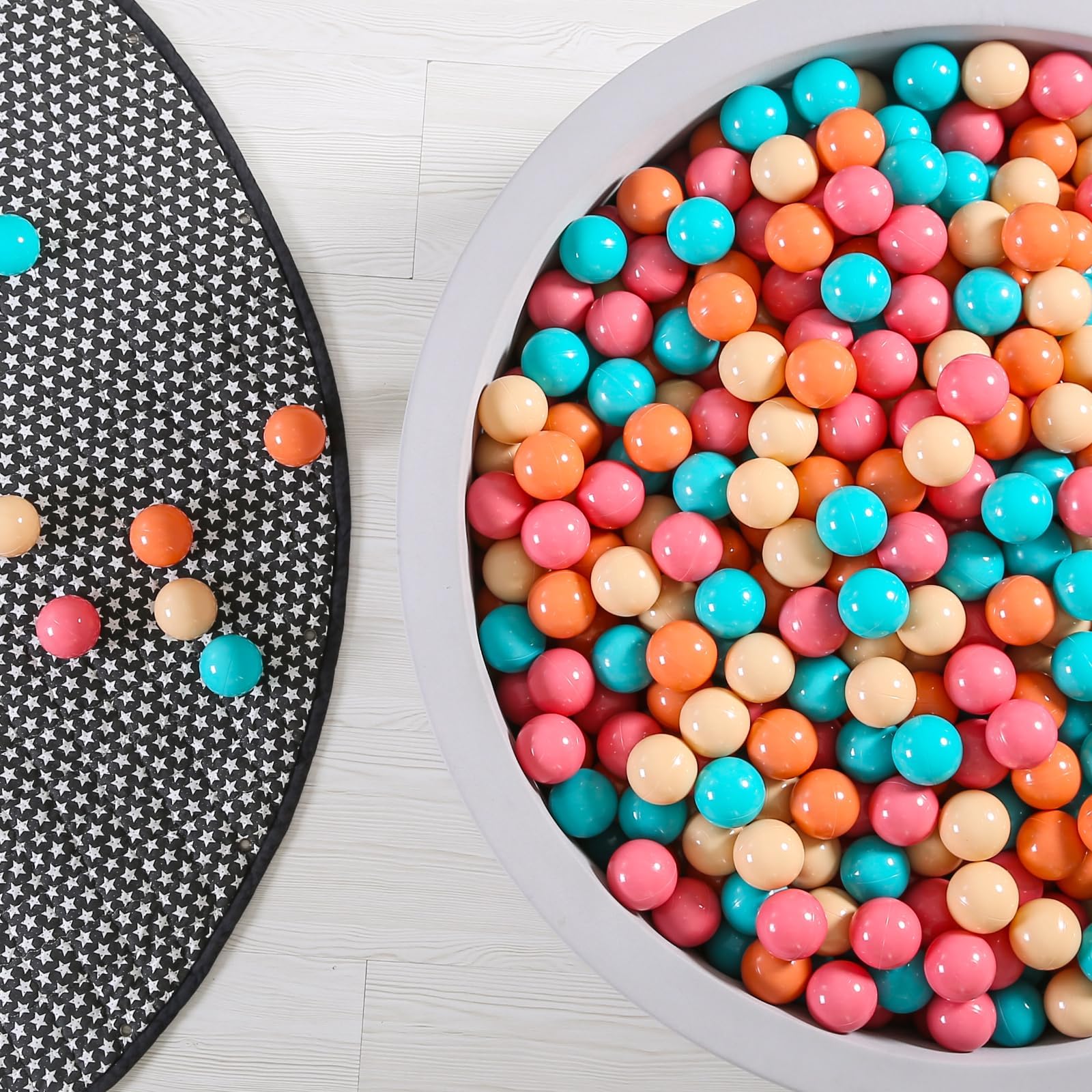 GOGOSO ball pit balls in cream pink and orange for toddlers.