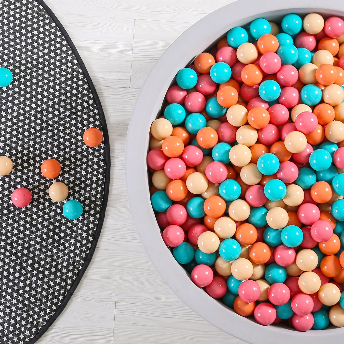 GOGOSO ball pit balls in cream pink and orange for toddlers.