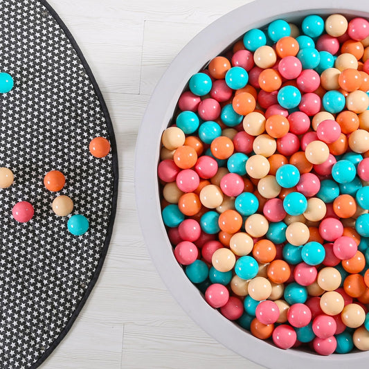 GOGOSO ball pit balls in cream pink and orange for toddlers.