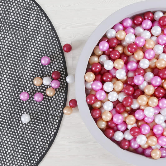 GOGOSO ball pit balls in dark pink, gold, white, and red for quick colorful pit setup.