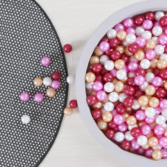 GOGOSO ball pit balls in dark pink, gold, white, and red for quick colorful pit setup.
