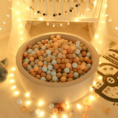 GOGOSO bear-colored balls scattered for imaginative ball pit adventures.