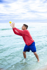 Goliath Wahu Water Bouncer teal lake or beach play by the water.