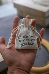 Good Luck Gift Pocket Bear fabric close-up shows soft texture.