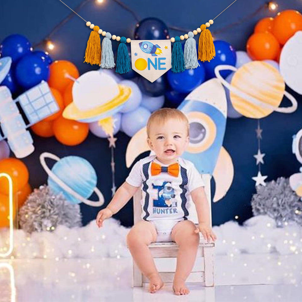 Gostman Outer Space One high chair banner space ship design enhances birthday photos.