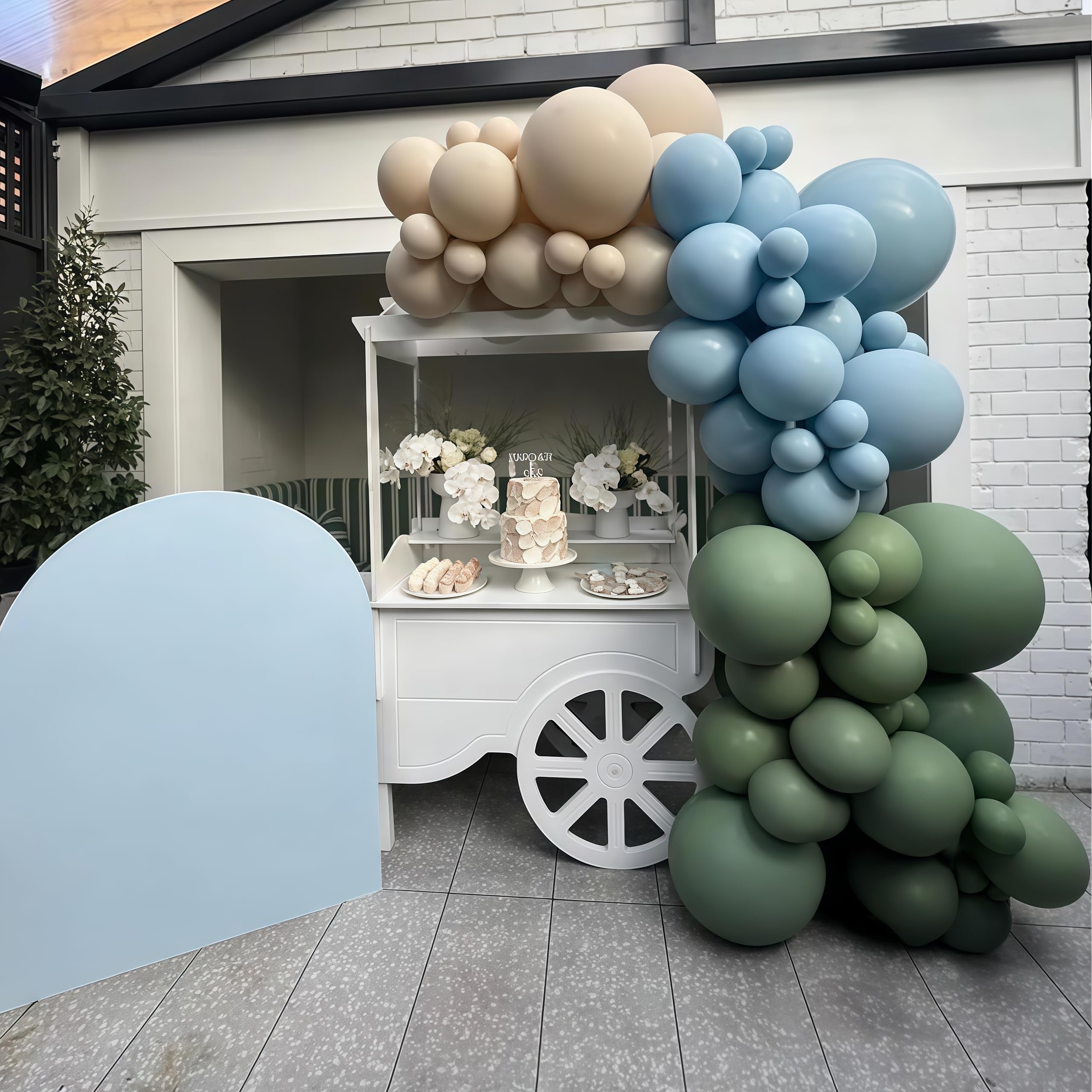 Govpy dusty blue balloon pairs with ivory accents for boho weddings.