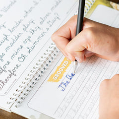 Graceful By Design ages 8-12 cursive workbook for developing handwriting skills.