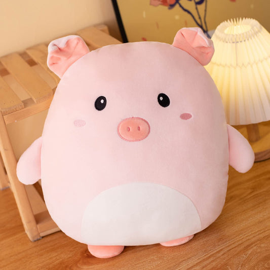 Grafingy Pig plush on bed adds playful decor as a throw pillow.