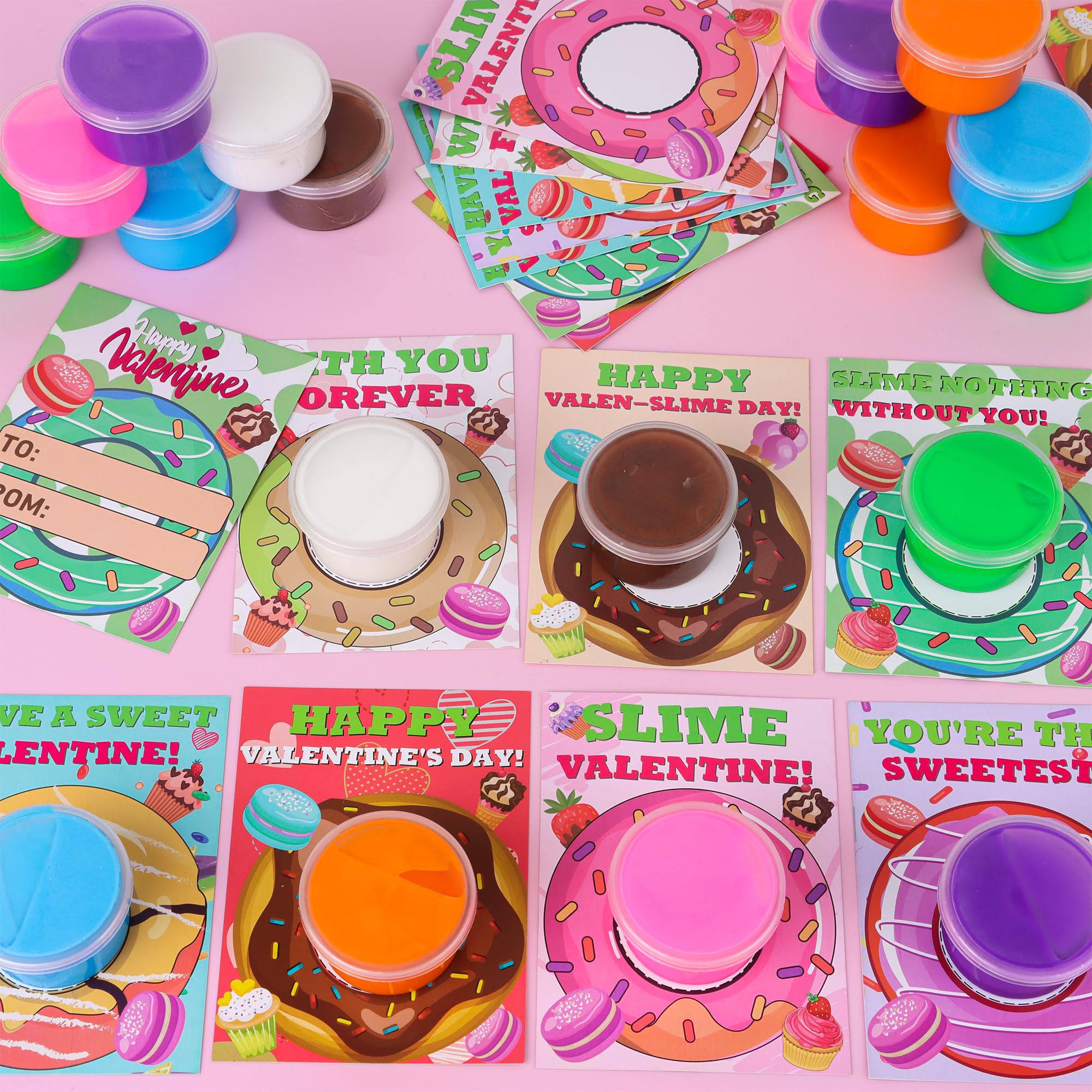 Grastfu glue dots securely attach slime to Valentine cards for neat designs.