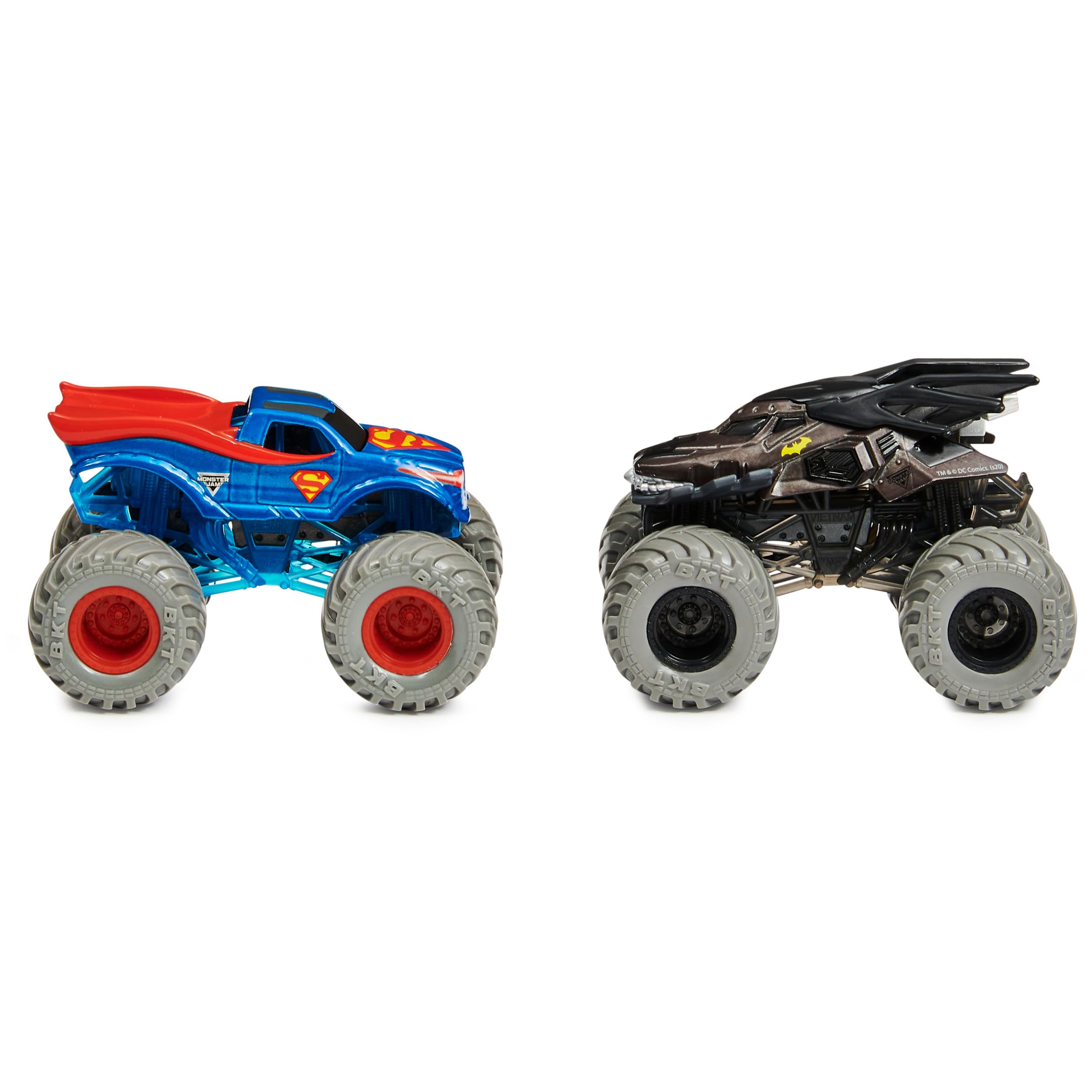 Grave Digger versus Max-D die-cast trucks with authentic styling for display.