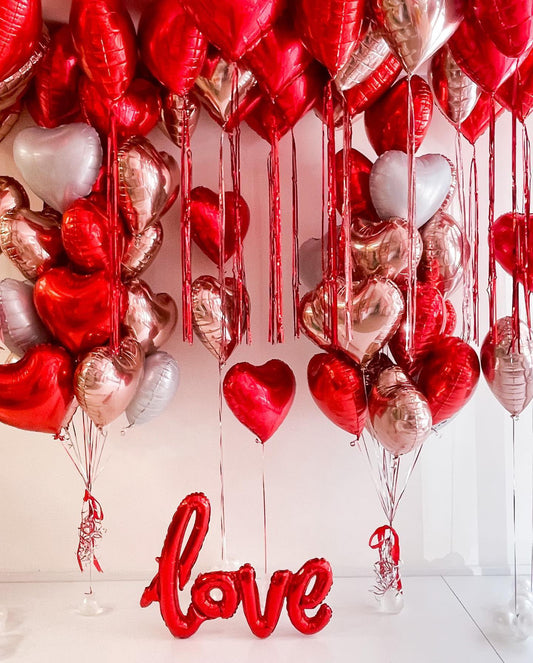 Grcypa red heart foil balloons 18x20 provide vivid focal points.