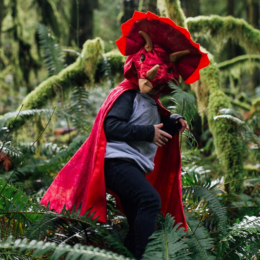 Great Pretenders Triceratops hooded cape with textured velour adds tactile fun to dress-up sessions.
