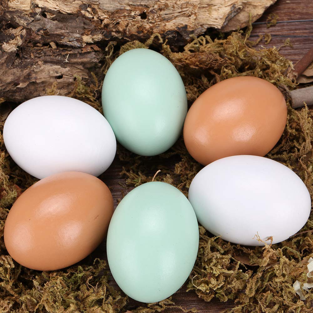 Green FABWOOD wooden fake eggs set for kitchen decor and display.