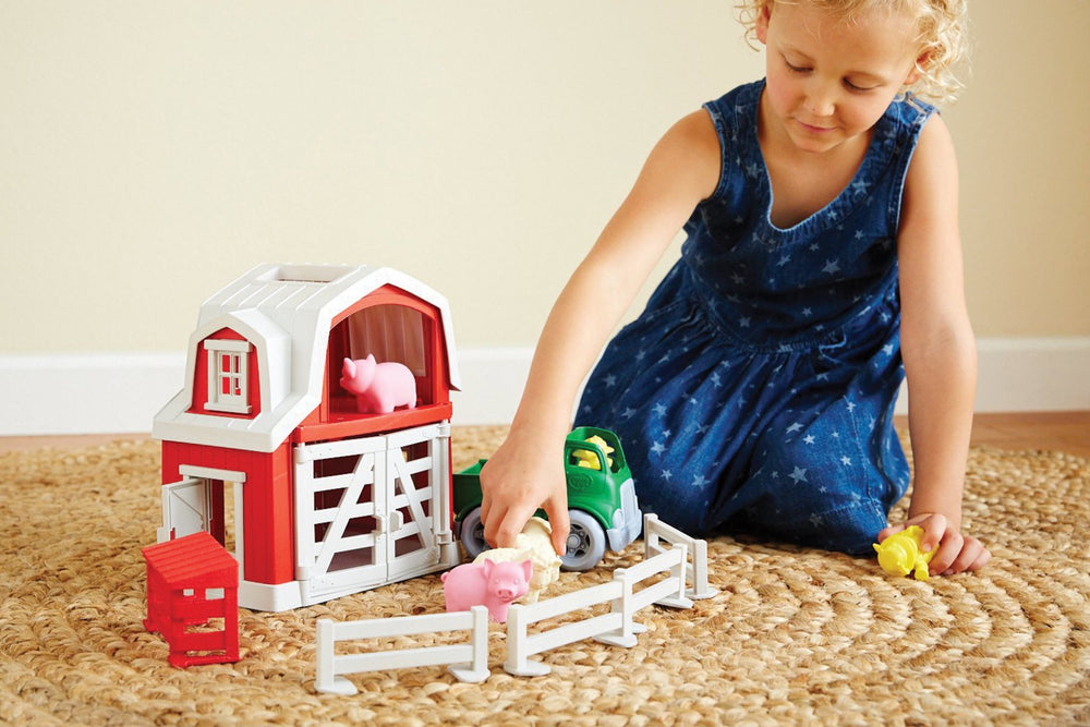 Green Toys Farm Playset farmer cow characters enhance language and role play.