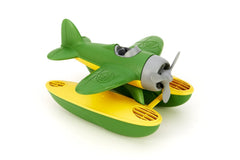 Green Toys Seaplane floats in the bath, inviting imaginative water adventures.