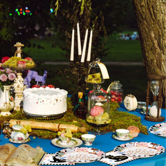 Grencian Onderland tea party scene with colorful tableware