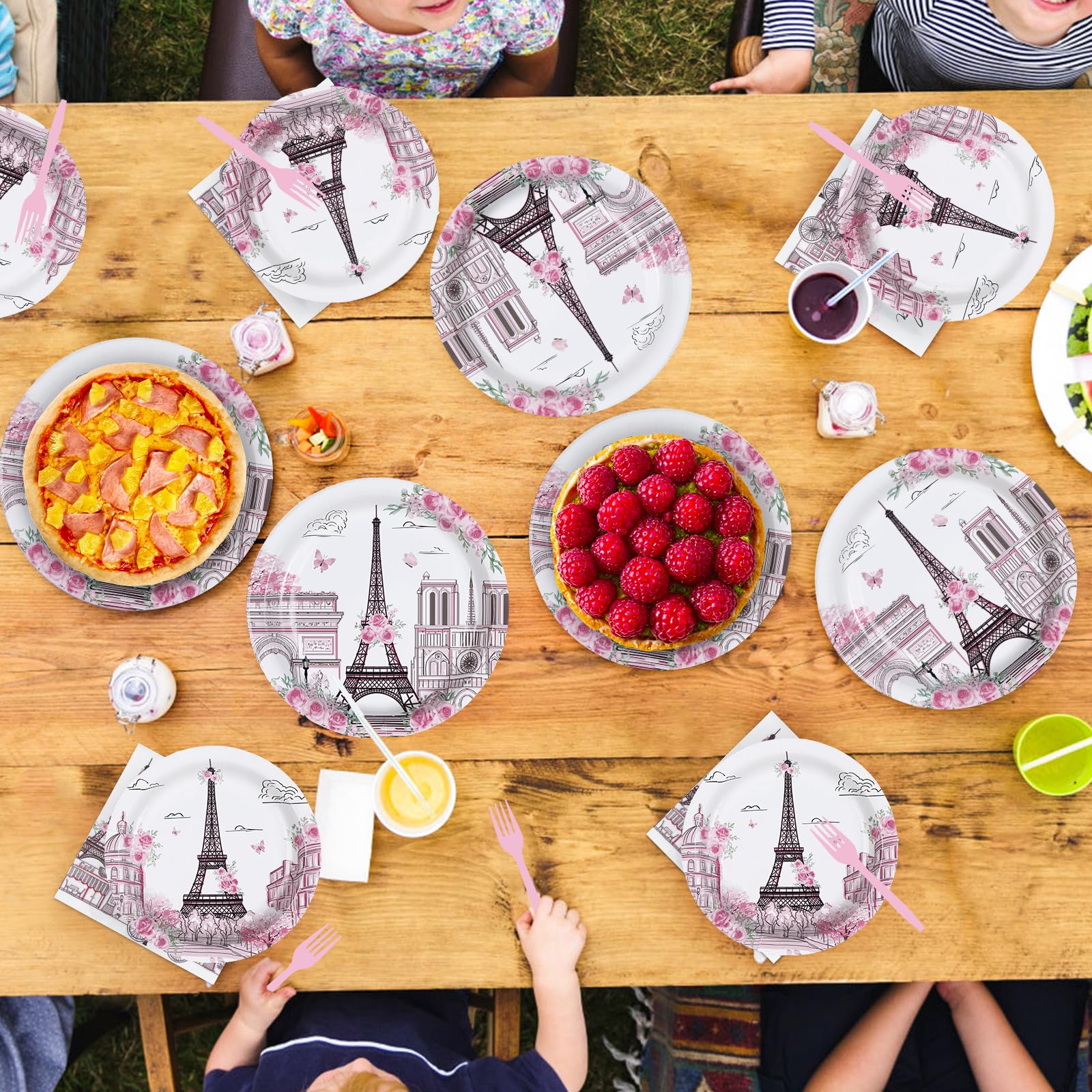 Grencian romantic Paris table setting, enhances ambiance with soft pink hues.
