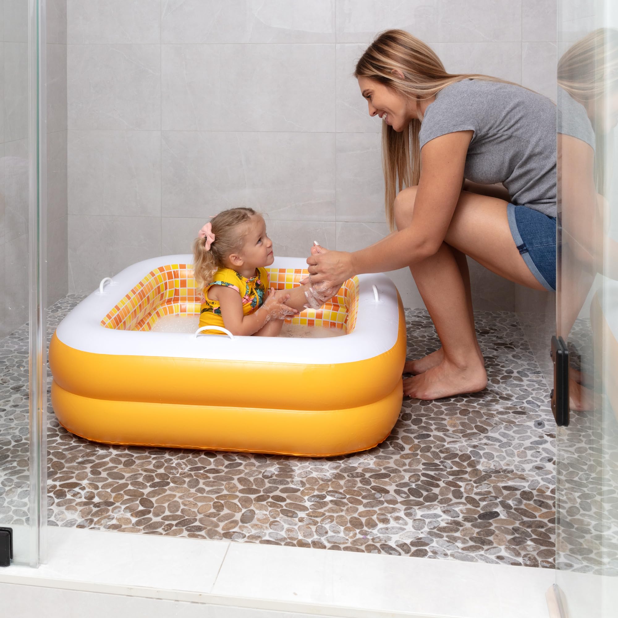 GRIP A POOL built-in handles assist little hands during play
