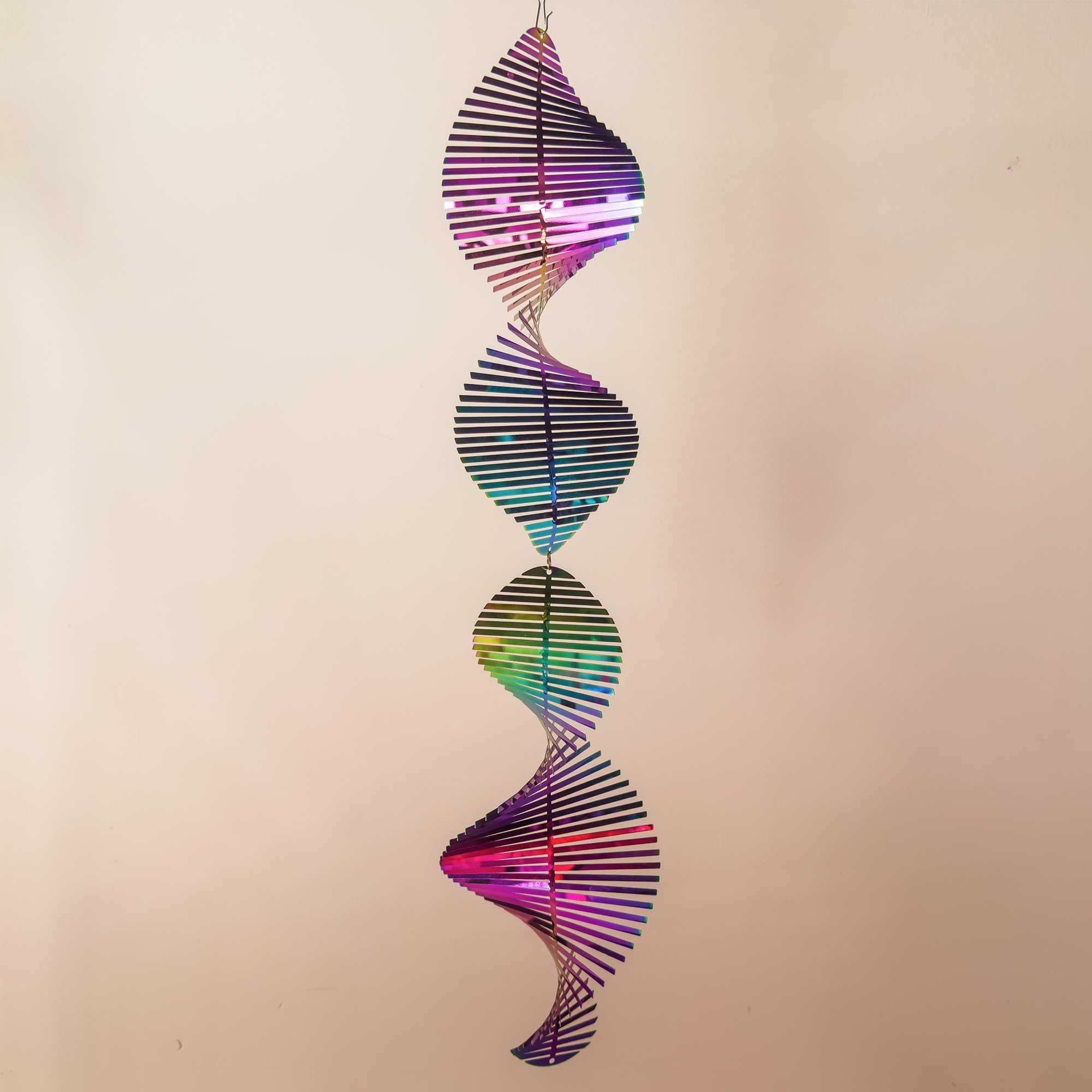 GRPWWT wind spinner reflects surrounding light, enhancing garden decor