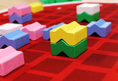 Cant Stop components layout emphasizing approachable tabletop entertainment.