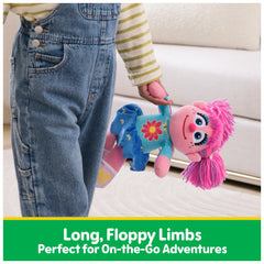 GUND Abby Cadabby Take Along Buddy blue flower-pattern outfit for instant recognition.