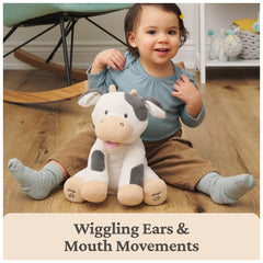 GUND Buttermilk cow ears wiggle during play, inviting sensory exploration for babies