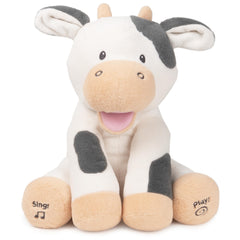 GUND Buttermilk cow singing close up, engaging baby with music and movement