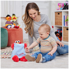 GUND Peek-a-Boo Elmo includes batteries for immediate activation.