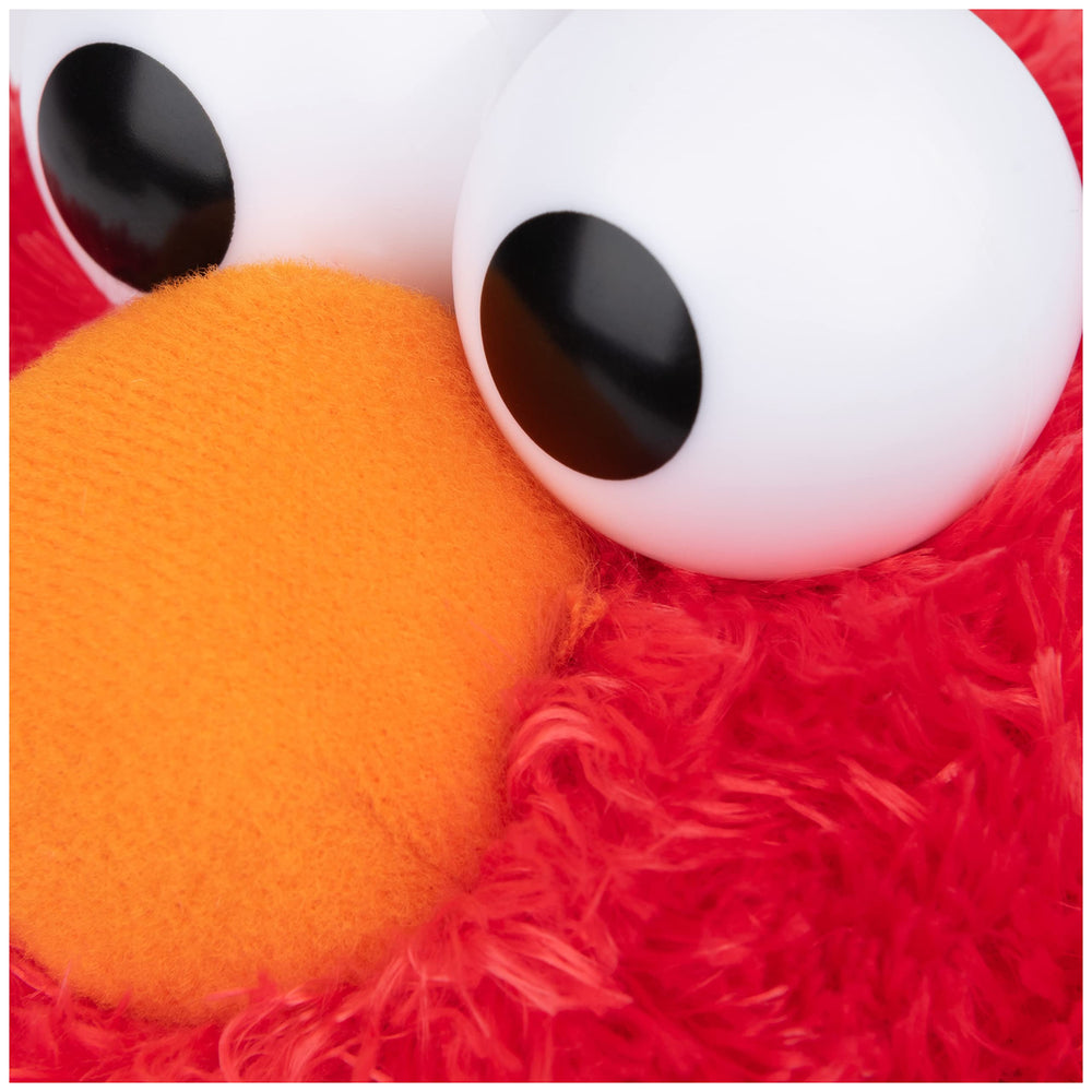 GUND Elmo 13-inch plush huggable body, ideal for bedtime cuddles.