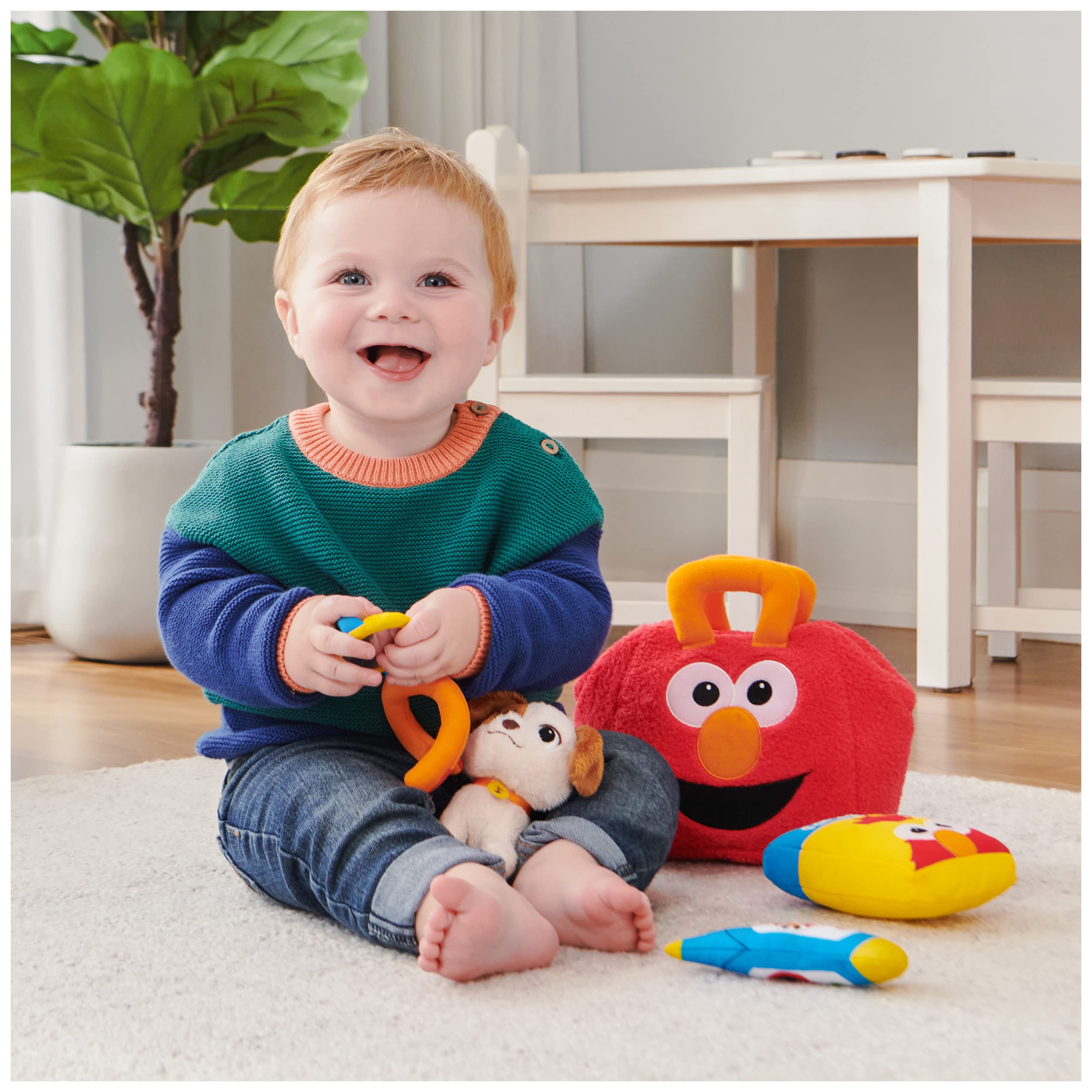 Elmo & Tango checkup bag open with plush toys and embroidered face
