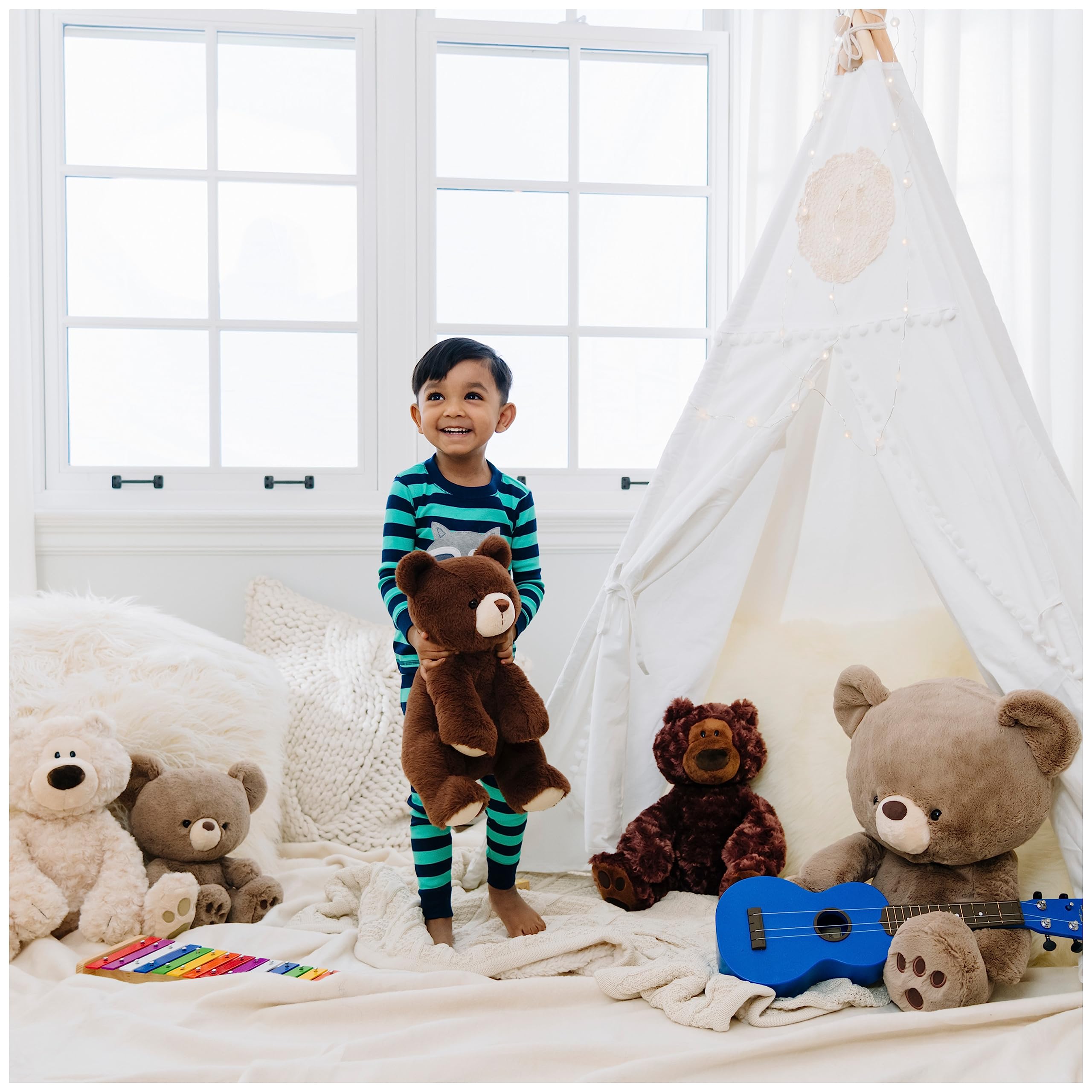 GUND Philbin with child showing age-appropriate soft toy for ages 1 and up.