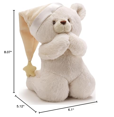 GUND Prayer Teddy Bear wearing a vintage sleeping cap, reassuring bedtime ritual companion.