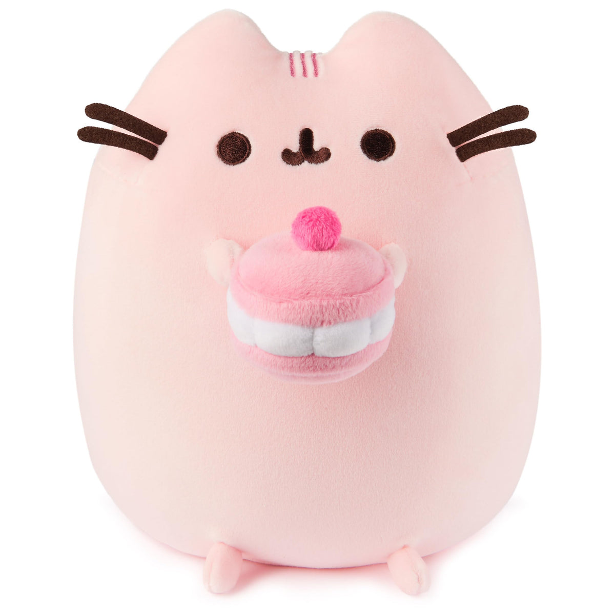 GUND Pusheen Cherry Macaron Squisheen plush holding a macaroon for cozy desk décor.