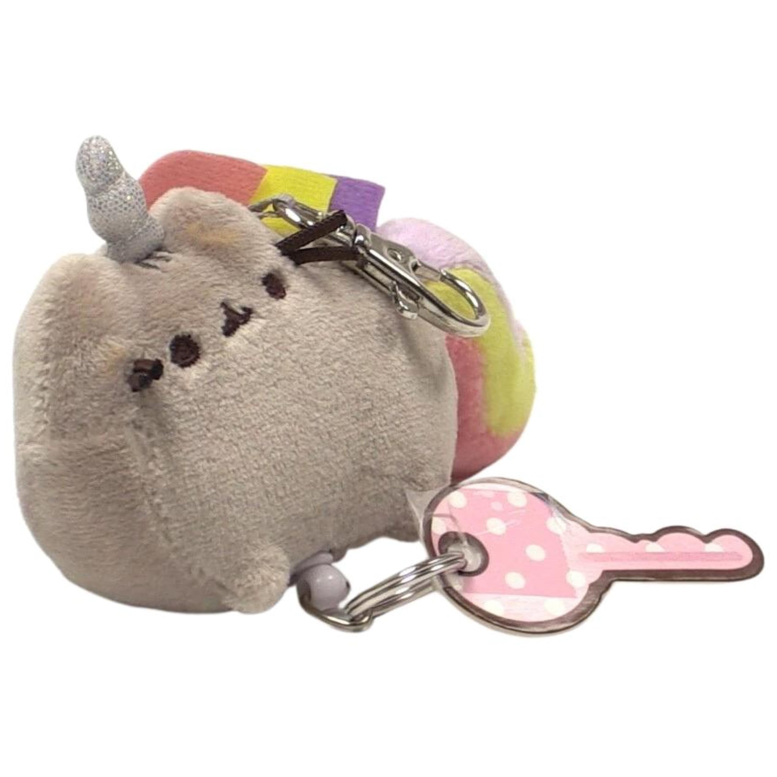 GUND Pusheenicorn key holder with secure metal clip attached to a bag