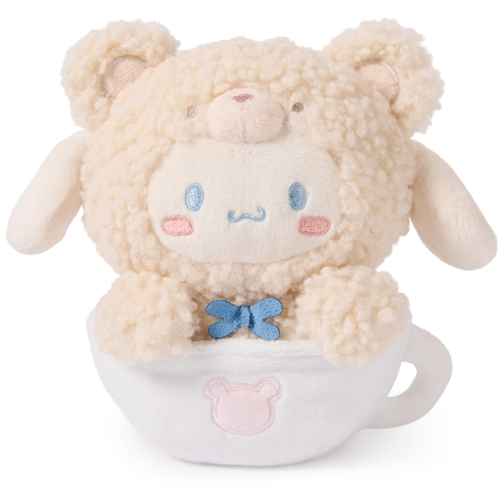 GUND Cinnamoroll plush sitting in a white mug for kawaii desk decor