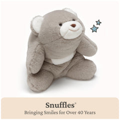 GUND Snuffles hug-back curved shape close-up emphasizing crescent cuddle.