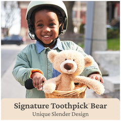 GUND Toothpick Cable teddy bear face close-up, textured plush feels like a soft sweater.