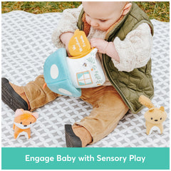GUND acorn rattle offers a gentle chime for baby focus.
