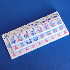 Blue tiles laid out on a table to show space-saving setup