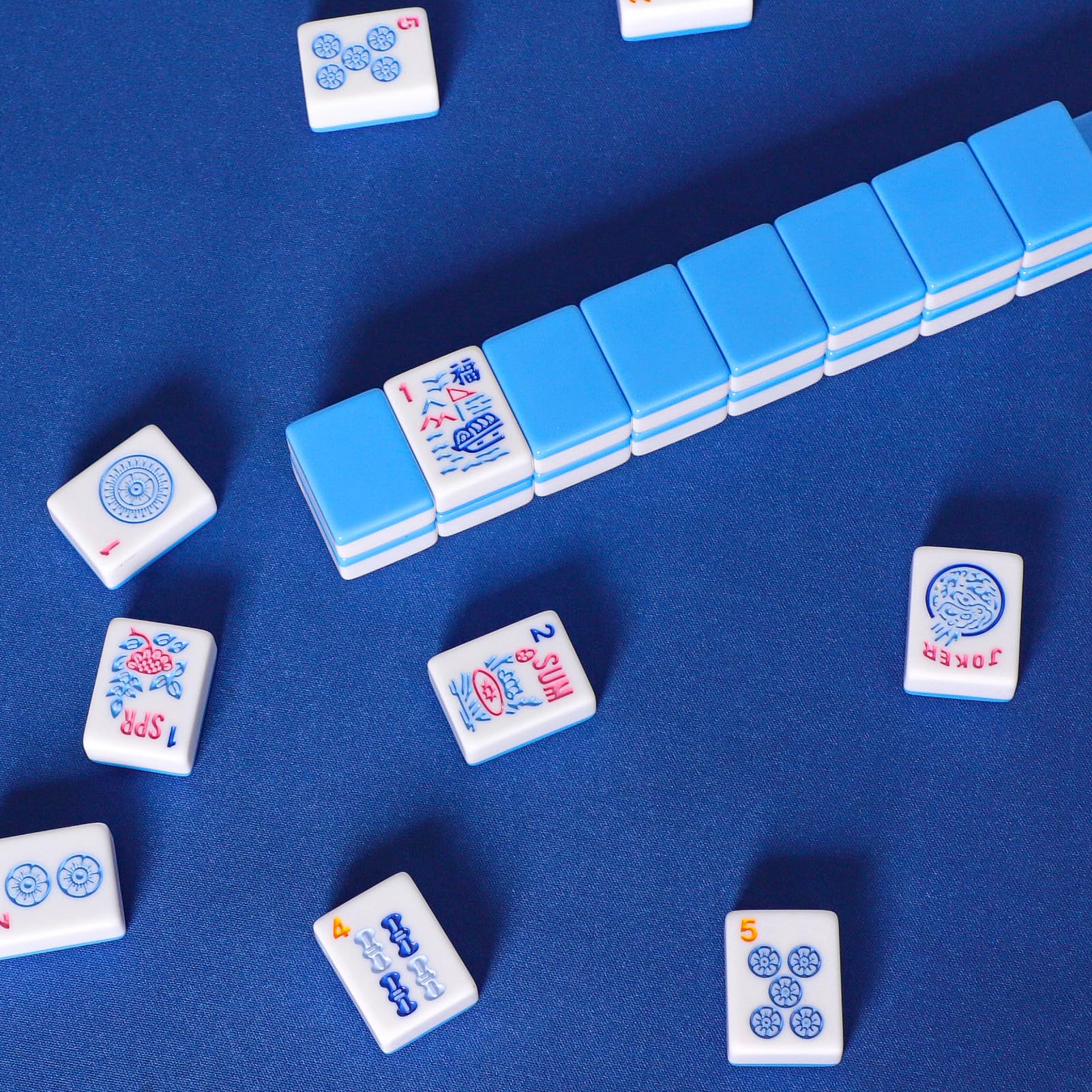 Travel-friendly layout of blue Mahjong tiles for on-the-go play