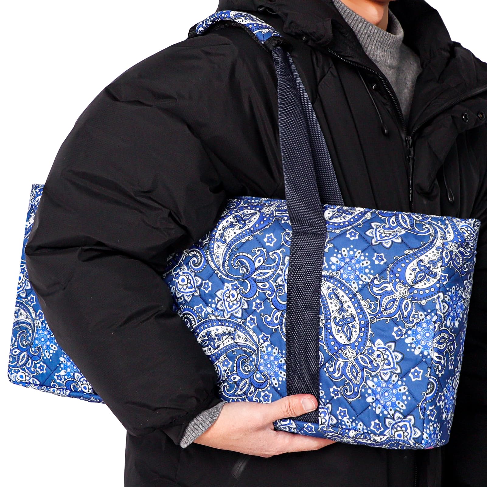 GUSTARIA small zip pocket keeps accessories secure during travel.