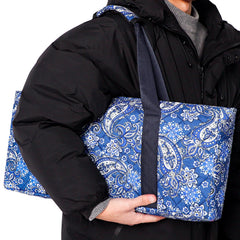 GUSTARIA small zip pocket keeps accessories secure during travel.