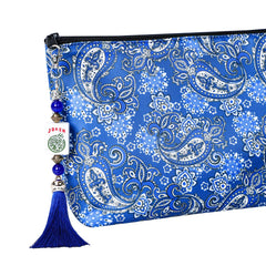GUSTARIA blue-accented accessory enhances any bag ensemble with elegant flair.