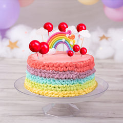 Gyufise toppers in varying sizes decorate layered cakes beautifully.